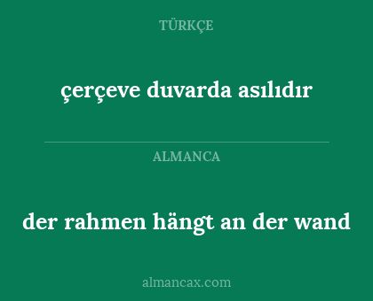 çerçeve duvarda asılıdır - der rahmen hängt an der wand
