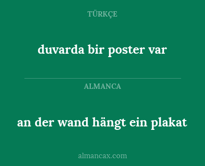 an der wand hängt ein plakat - duvarda bir poster var
