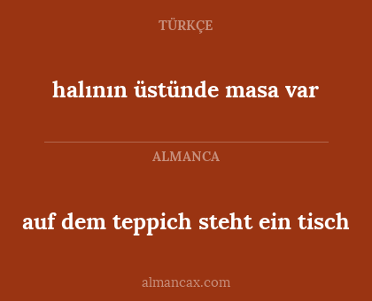 auf dem teppich steht ein tisch - halının üstünde masa var