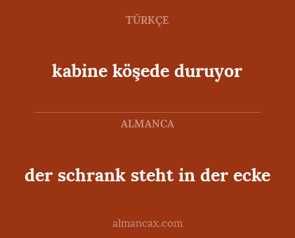 kabine köşede duruyor - der schrank steht in der ecke
