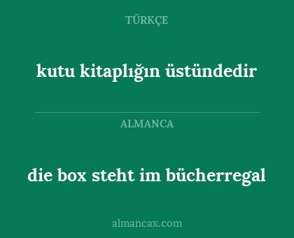 die box steht im bücherregal - kutu kitaplığın üstündedir