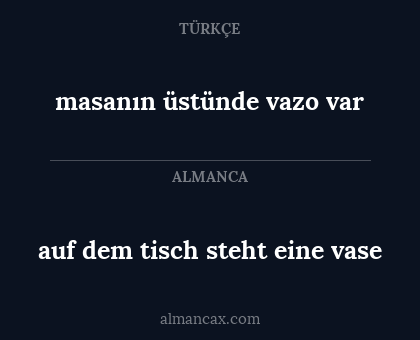 auf dem tisch steht eine vase - masanın üstünde vazo var