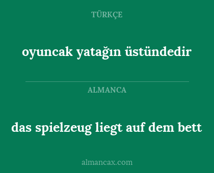 das spielzeug liegt auf dem bett - oyuncak yatağın üstündedir
