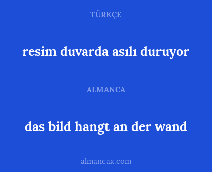 resim duvarda asılı duruyor - das bild hangt an der wand