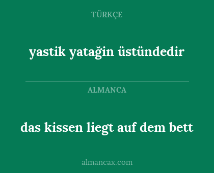 das kissen liegt auf dem bett - yastik yatağin üstündedir
