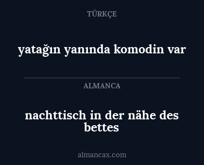 yatağın yanında komodin var - nachttisch in der nähe des bettes