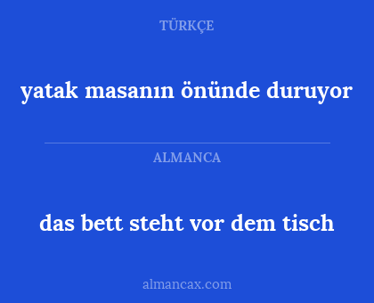 das bett steht vor dem tisch - yatak masanın önünde duruyor
