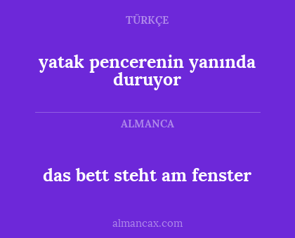 yatak pencerenin yanında duruyor - das bett steht am fenster
