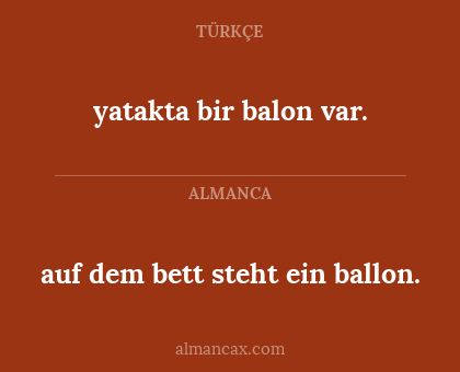 auf dem bett steht ein ballon. - yatakta bir balon var.