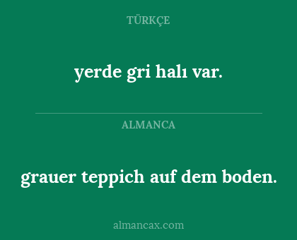 yerde gri halı var. - grauer teppich auf dem boden.